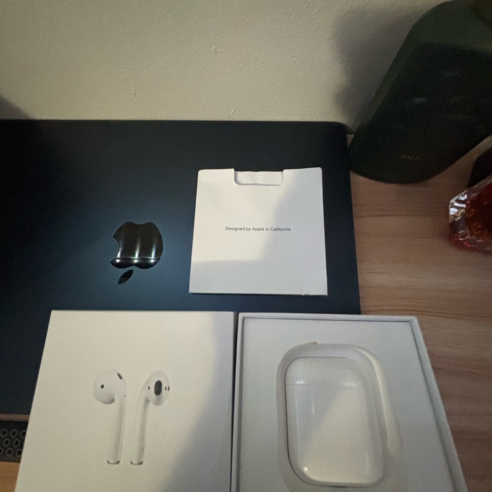 Apple AirPods with protective case